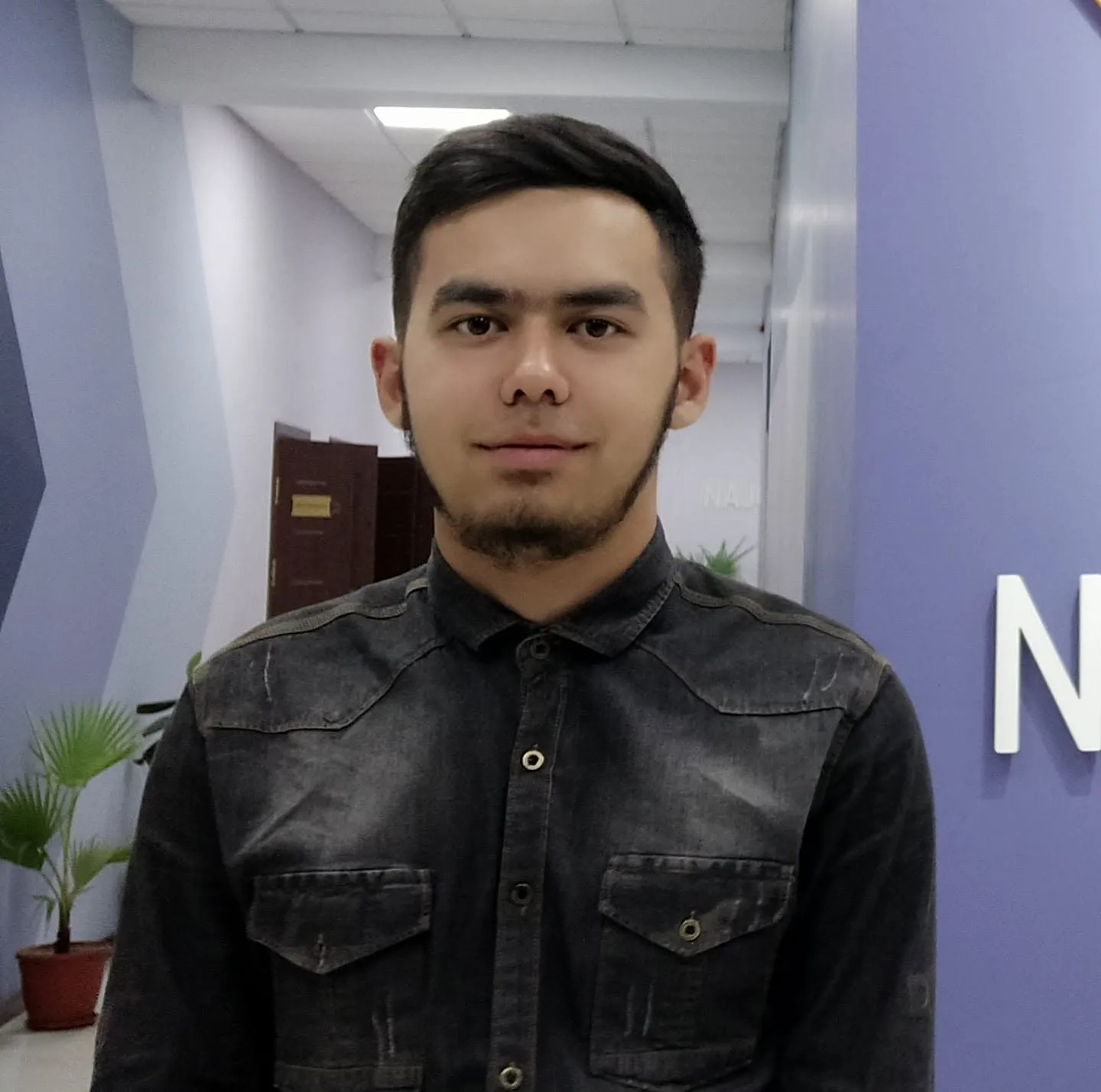 me in an office hallway in tashkent